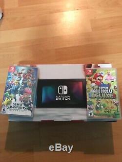 Brand New Nintendo Switch with NEW SEALED Super Smash and Super Mario
