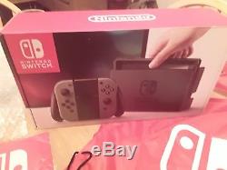 NEWithSEALED Nintendo Switch 32GB Console with 1st day release bag & extras