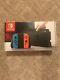 New Sealed Nintendo Switch 32GB Gray Console (with Neon Red/Neon Blue Joy-Con)
