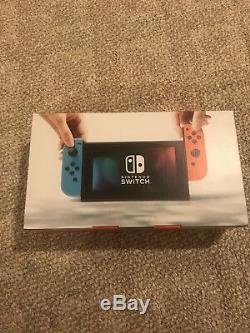 New Sealed Nintendo Switch 32GB Gray Console (with Neon Red/Neon Blue Joy-Con)