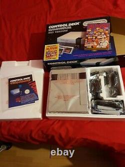 New mint condition and unplayed nes dr mario console and mint sealed mario game