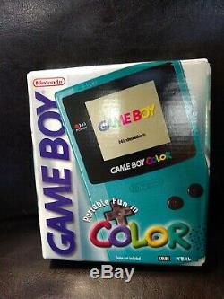 Nintendo Game Boy Color Teal New in Box Sealed (NIB) PLUS TOY STORY 2 GAME NEW