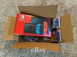 Nintendo Switch Console with Red and Blue JoyCon BRAND NEW + 2 GAMES (Sealed)