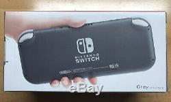 Nintendo Switch Lite Gray Bundle. New In Box With 3 Games Sealed In Package