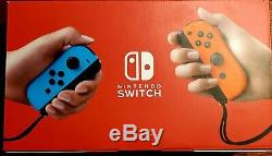 Nintendo Switch with Neon Blue/Red Joy Con (New, Sealed, Unopened)