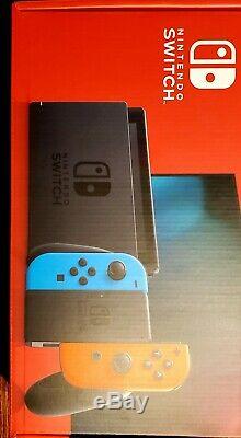 Nintendo Switch with Neon Blue/Red Joy Con (New, Sealed, Unopened)