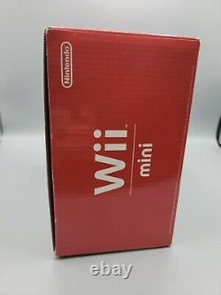 Nintendo Wii Mini 8GB Console Bundle with Mario Kart Red Brand New Sealed